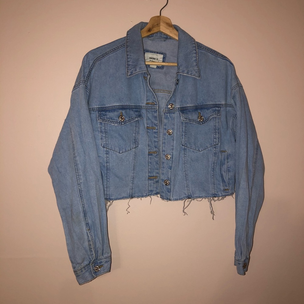 Distressed cropped jean jacket, size medium but fits like a large